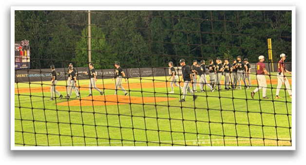 A group of people are standing on a baseball field. AI generated content