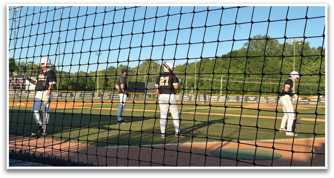 Baseball players standing on a field, some wearing helmets. AI generated content