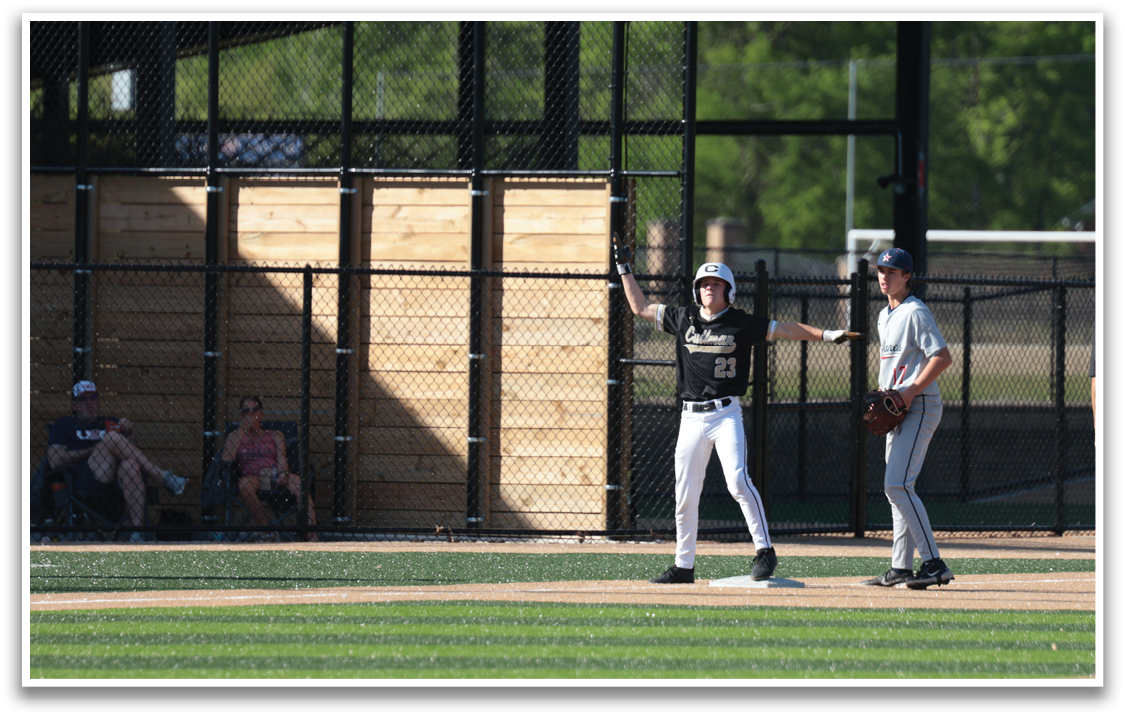 A baseball player is holding a bat and standing on a field. AI generated content