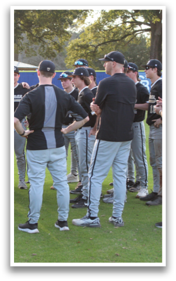 A group of baseball players wearing black and grey uniforms are standing on a field. AI generated content
