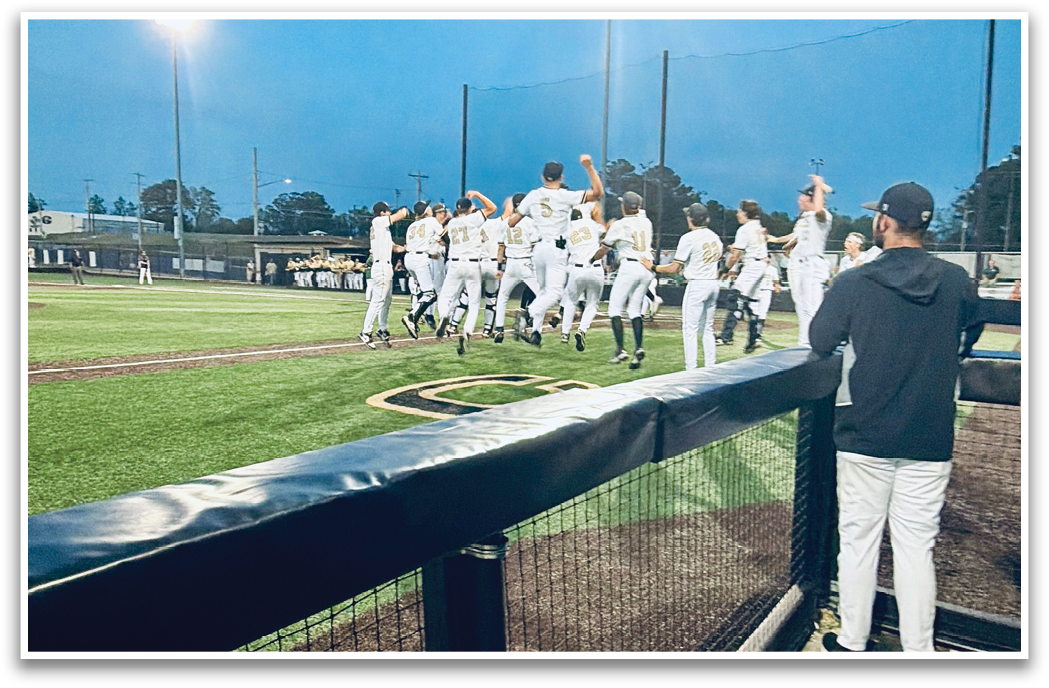 A group of baseball players are standing on the field, celebrating their victory. AI generated content