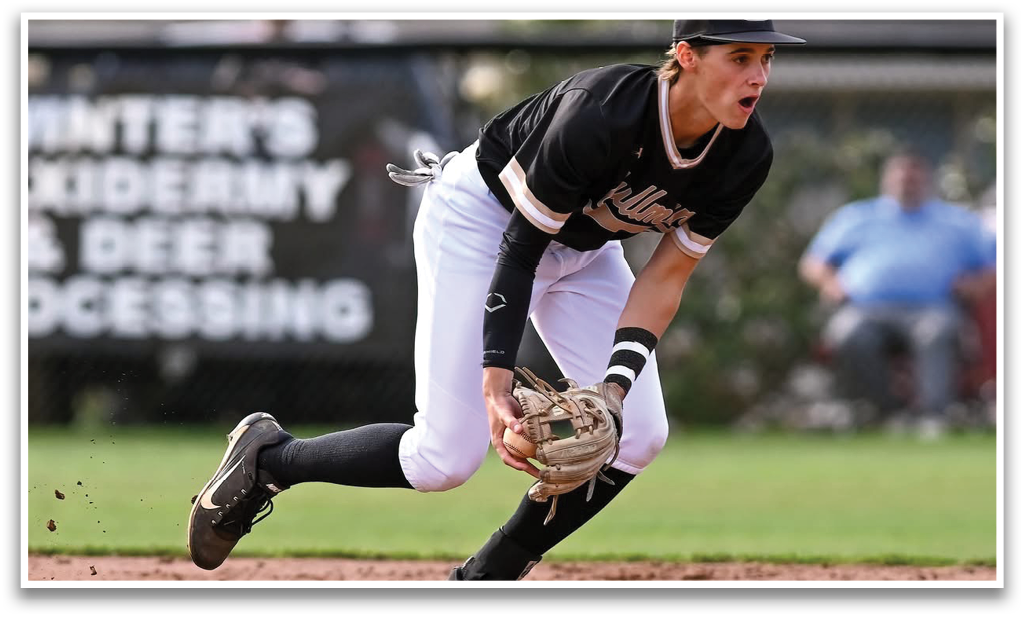 A baseball player catching a ball. Description generated by AI