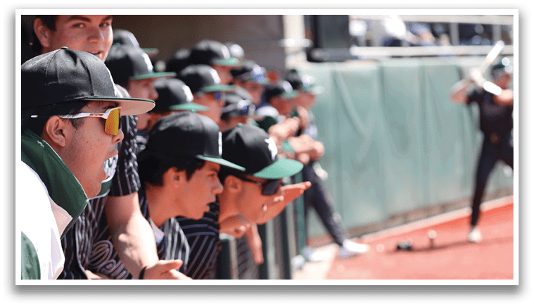 Baseball players sitting on the bench. Description generated by AI