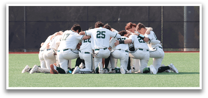 Baseball players wearing green and white uniforms. Description generated by AI