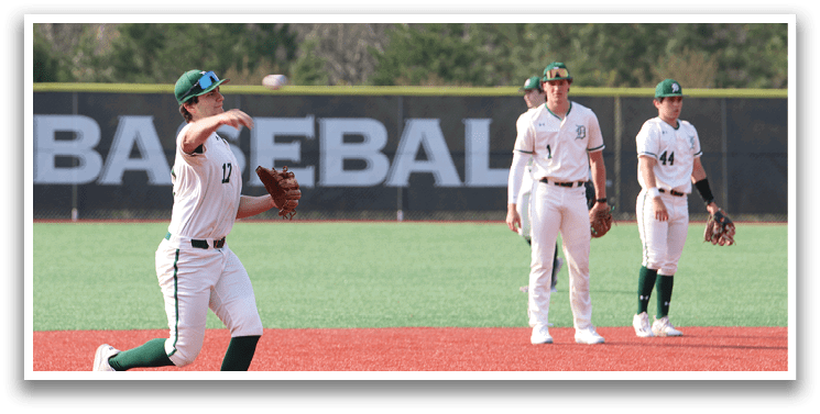 A baseball player wearing a white jersey with the number 10 on it. Description generated by AI