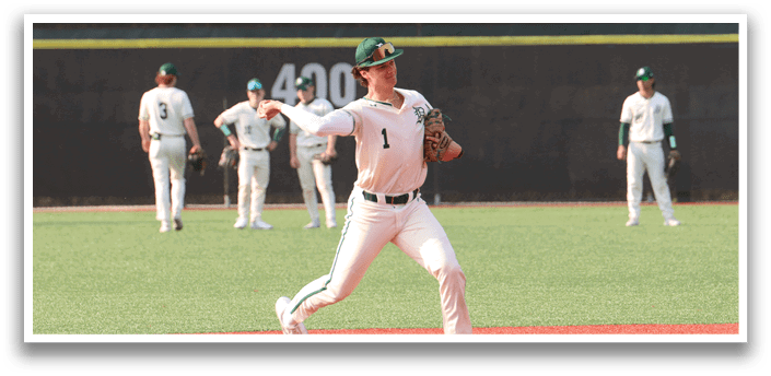 A baseball player wearing a white uniform and green hat is running on the field. Description generated by AI