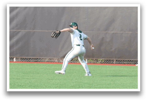 A baseball player is throwing a ball on a field. Description generated by AI