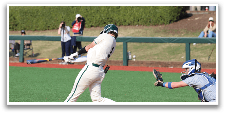 A baseball player is swinging a bat at a ball. Description generated by AI