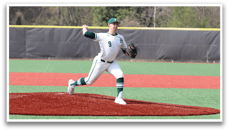 A baseball player in a white and green uniform is pitching a ball. Description generated by AI