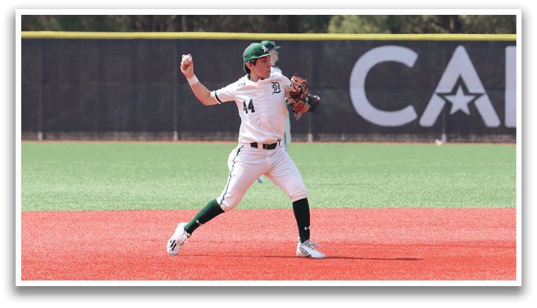 A baseball player in a white uniform with the number 16 on the back of it. Description generated by AI