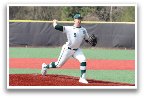 A baseball player in a white and green uniform is pitching a ball. Description generated by AI
