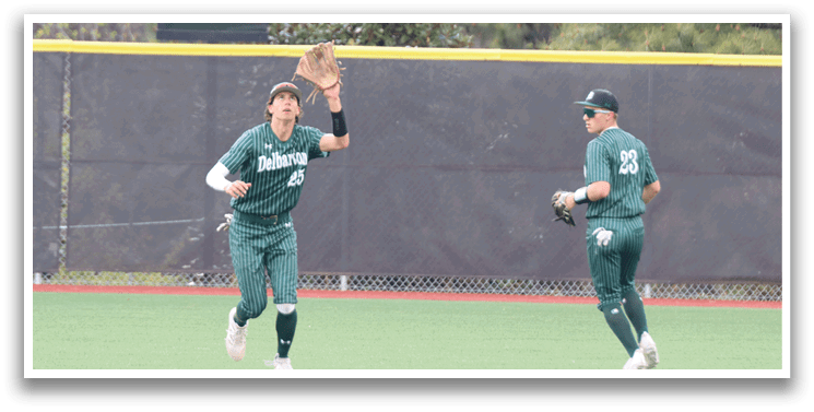 Two baseball players on a field. Description generated by AI