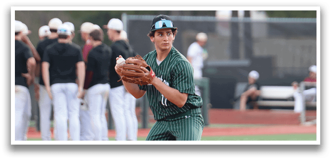 A baseball player in a green and white uniform is throwing a ball. Description generated by AI
