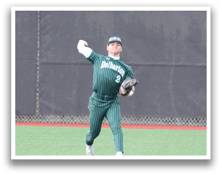 A baseball player in a green and white uniform is throwing a ball. Description generated by AI