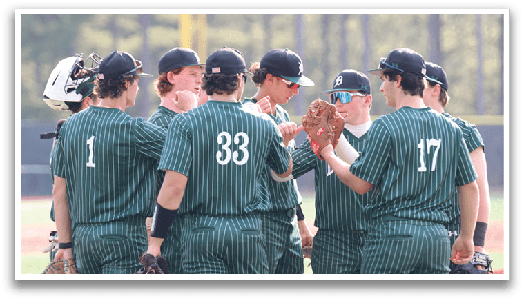 A group of baseball players wearing green and black uniforms. Description generated by AI