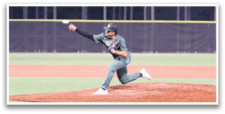 A baseball player in a green shirt and white shoes is throwing a ball. Description generated by AI