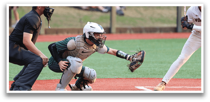 A baseball player is swinging a bat at a ball. Description generated by AI
