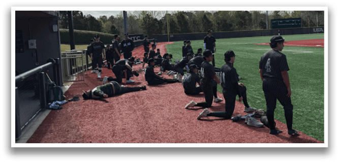 Two lacrosse players from the team Delaware are talking to each other. AI generated content