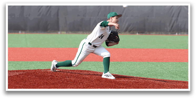 A baseball player in a white and green uniform is pitching a ball. Description generated by AI