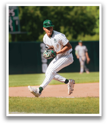 A baseball player is standing on the pitcher's mound. Description generated by AI