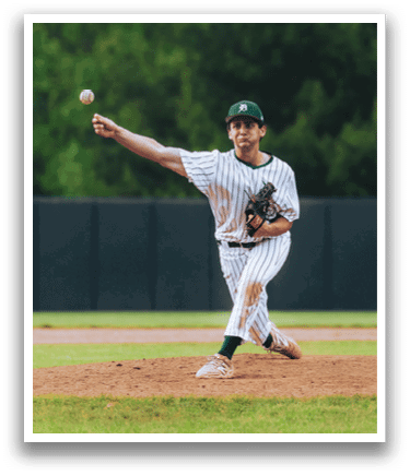 A baseball player is standing on the pitcher's mound. Description generated by AI