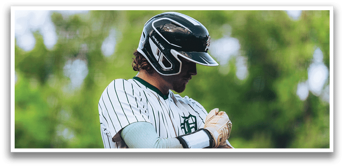 A baseball player on the field. Description generated by AI