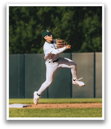 A baseball player is standing on the pitcher's mound. Description generated by AI