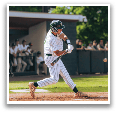 A baseball player is standing on the field. Description generated by AI