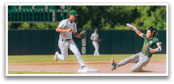A baseball player is at bat, holding a bat and wearing a black and white uniform. Description generated by AI
