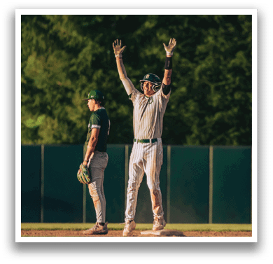 A baseball player is standing on the field. Description generated by AI