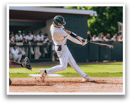 A baseball player is sliding into home plate. Description generated by AI
