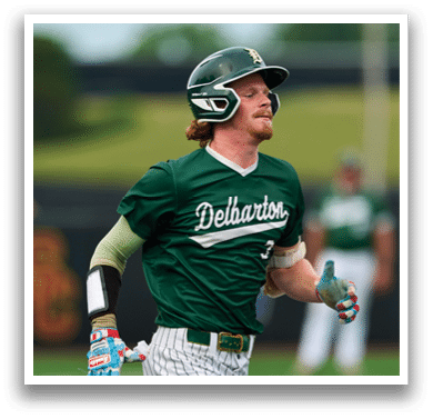 A baseball player is standing on the field. Description generated by AI