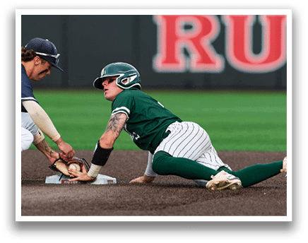 A baseball player is sliding into home plate. Description generated by AI