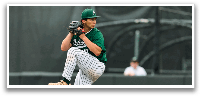 A baseball player is at bat, holding a bat and wearing a black and white uniform. Description generated by AI