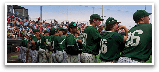 A group of people standing together, one of them wearing a jersey with the number 33. Description generated by AI