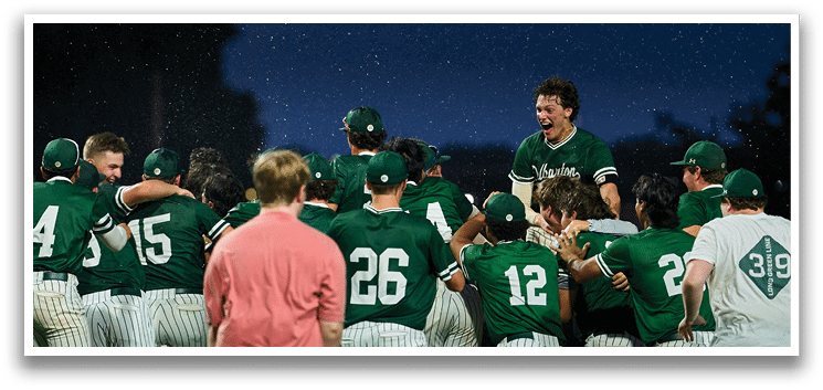 A group of young men wearing green and white uniforms. Description generated by AI