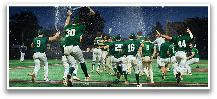 Five men wearing green jerseys with the number 11, 18, 19, 24, and 34 on them. Description generated by AI