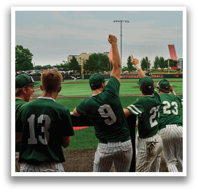 A baseball player is standing on the field. Description generated by AI