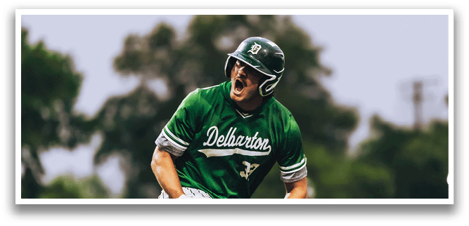 A baseball player is at bat, holding a bat and wearing a black and white uniform. Description generated by AI