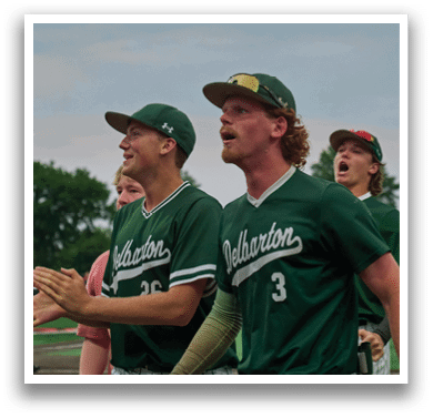 A baseball player is standing on the field. Description generated by AI