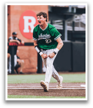 A baseball player is standing on the pitcher's mound. Description generated by AI