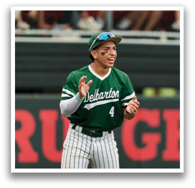 A baseball player in a striped uniform is swinging a bat. Description generated by AI
