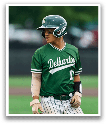 A baseball player is swinging a bat on a field. Description generated by AI