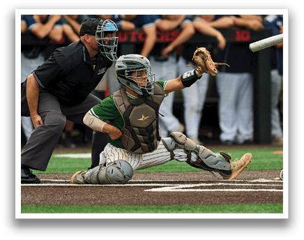 A baseball player is holding a bat and getting ready to swing. Description generated by AI