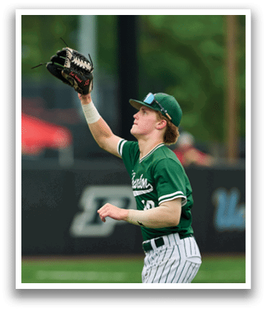 A baseball player is standing on the pitcher's mound. Description generated by AI