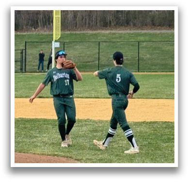 Two baseball players walking on a field. Description generated by AI