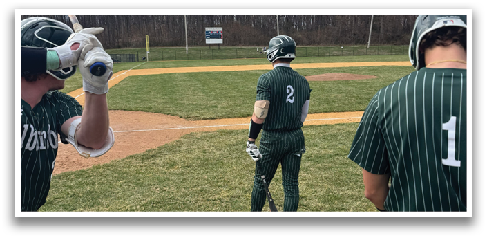 Baseball players on a field. Description generated by AI