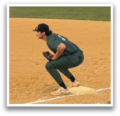 A baseball player is crouching on the field. Description generated by AI