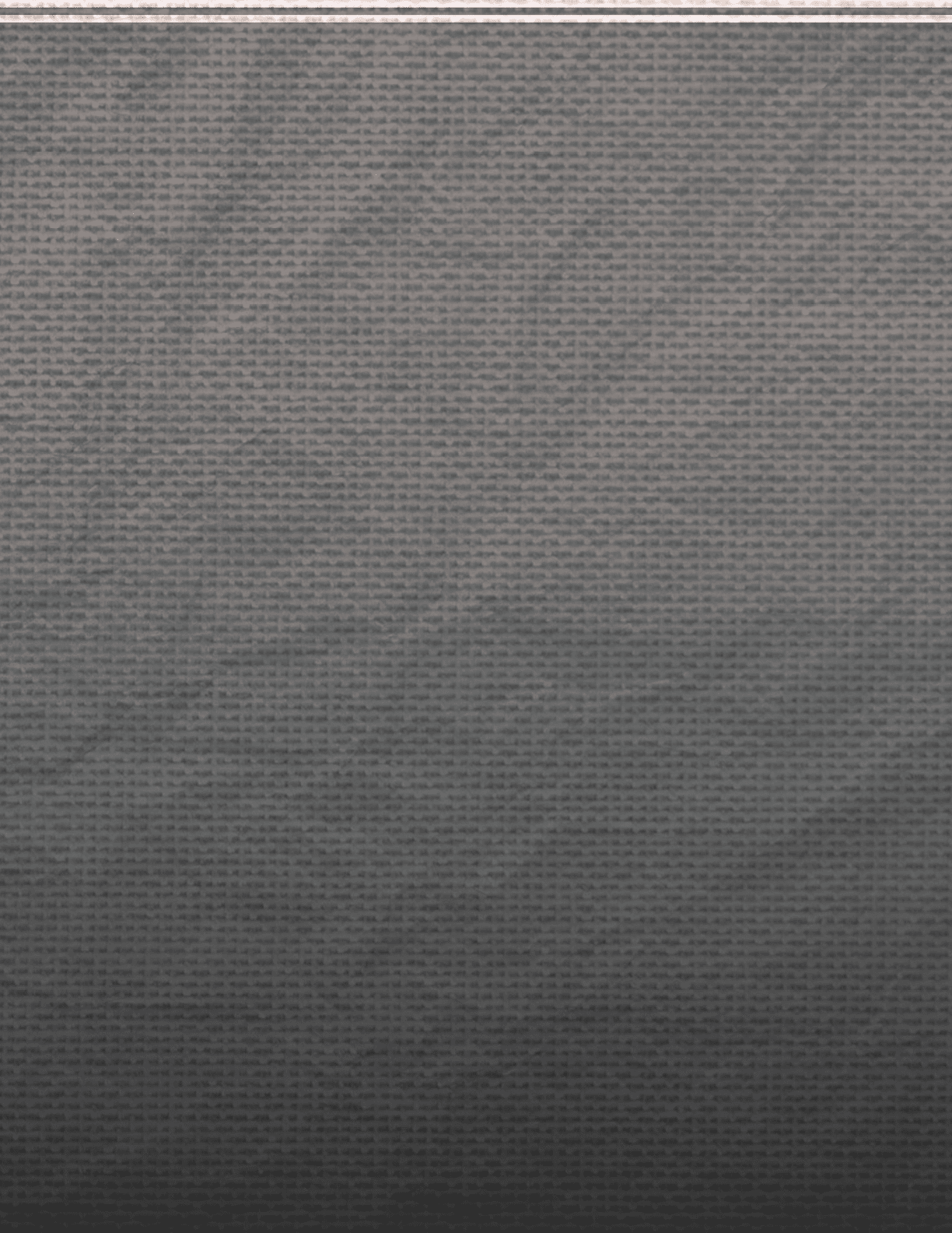 A gray cloth with a wrinkled surface. Description generated by AI