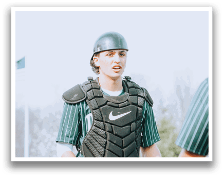 A baseball player wearing a helmet and a catcher's mitt. Description generated by AI
